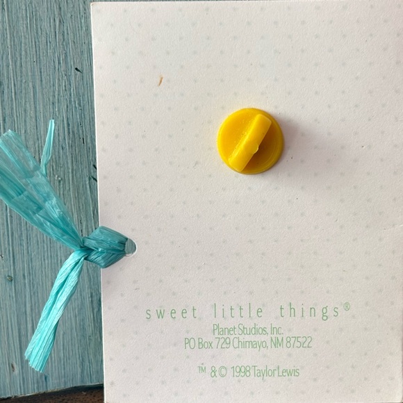 Tiny little bunny pin with pink ears, a blue bow, and white “heart” cottontail - Picture 4 of 12